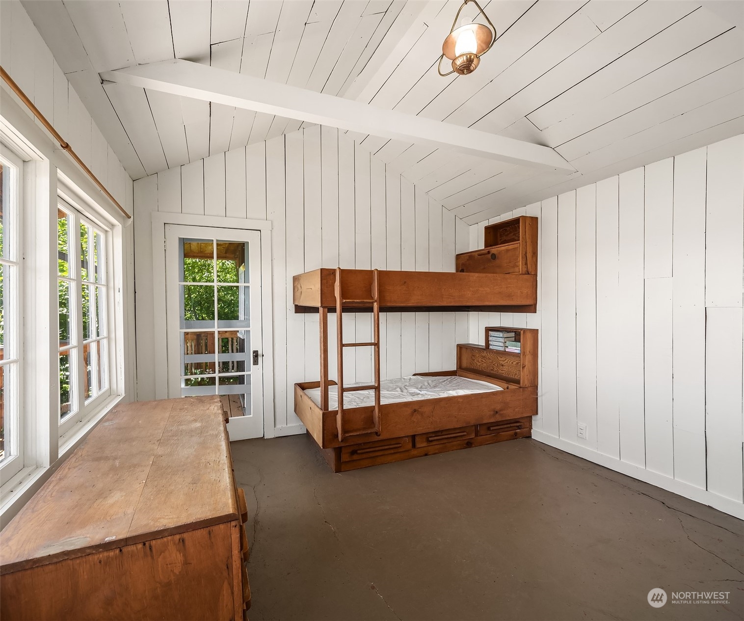 11814 Southwest Dolphin Point Road Vashon, WA 98070 - Photo 20 of 31 a room with natural light