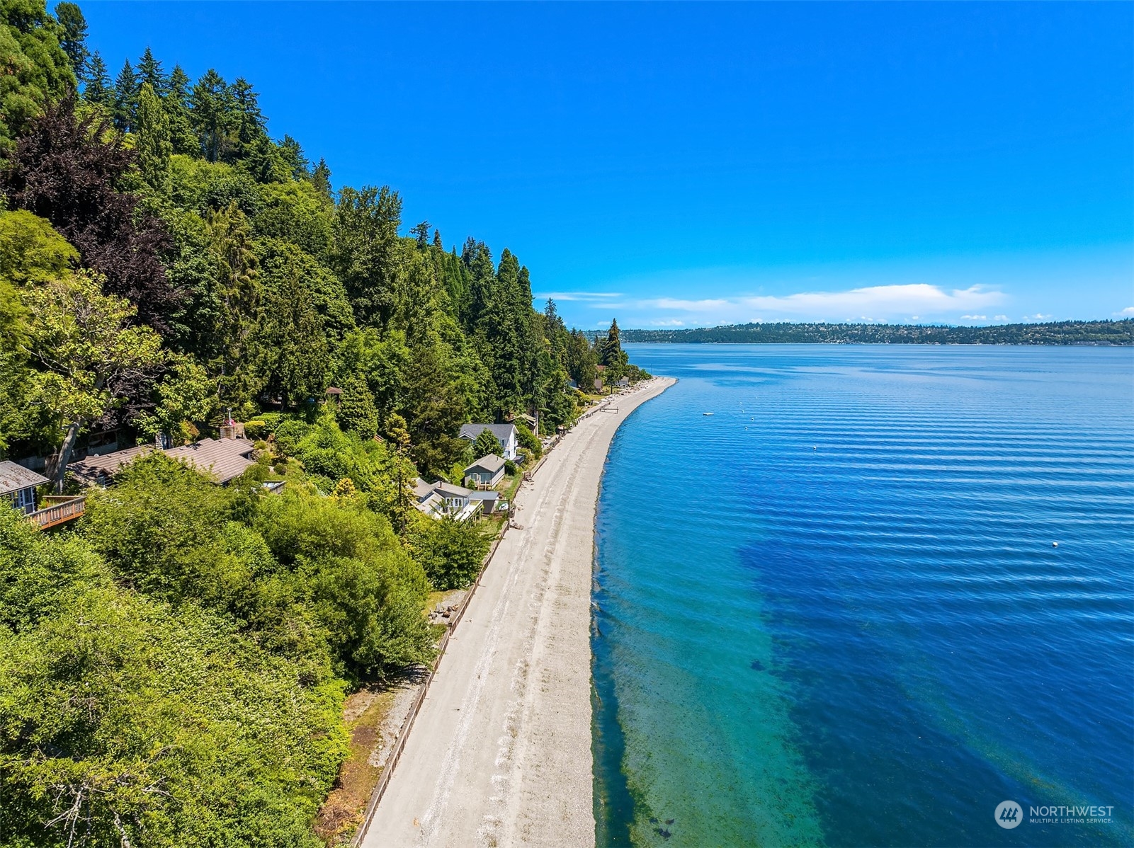 11814 Southwest Dolphin Point Road Vashon, WA 98070 - Photo 24 of 31 a view of a ocean with a yard