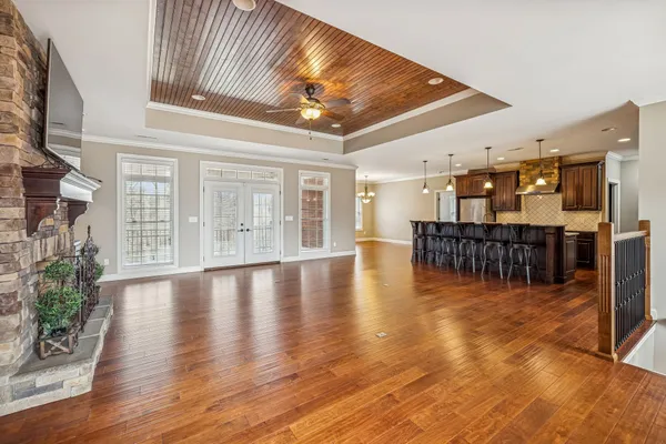 a bathroom with a toilet a sink and a window