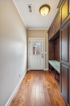 a bathroom with a sink toilet and mirror
