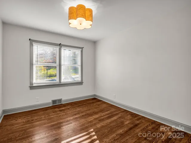 a view of a room that has a window in it