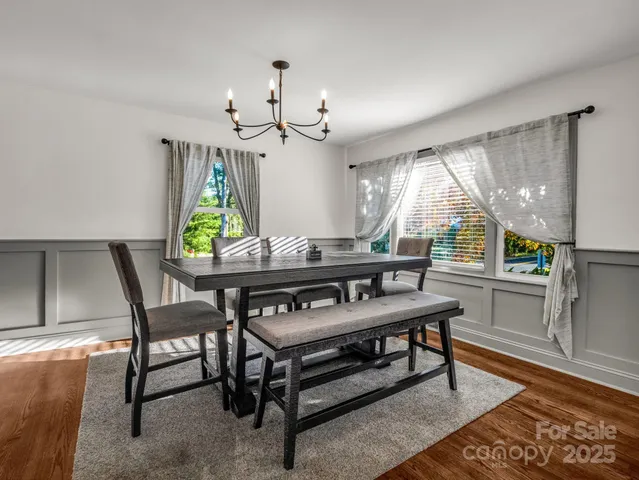 a view of a dining room with furniture