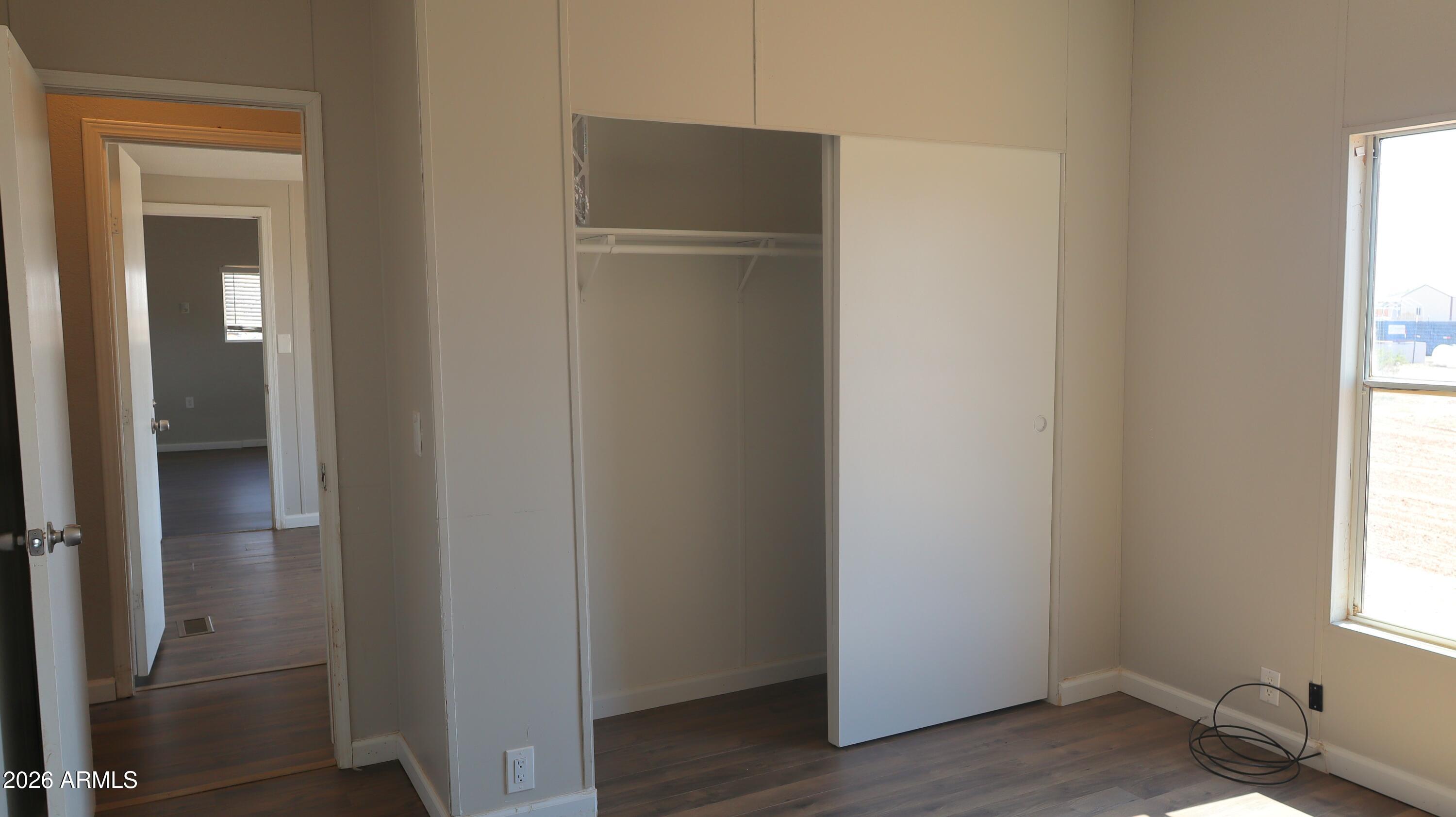 20163 North Sage Street Maricopa, AZ 85139 - Photo 20 of 54 a view of walk in closet with window