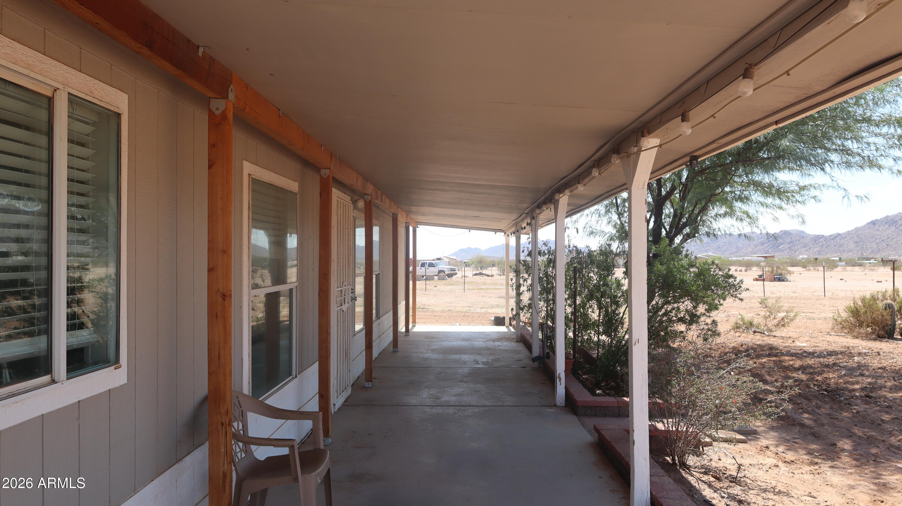 20163 North Sage Street Maricopa, AZ 85139 - Photo 3 of 54 a view of a porch