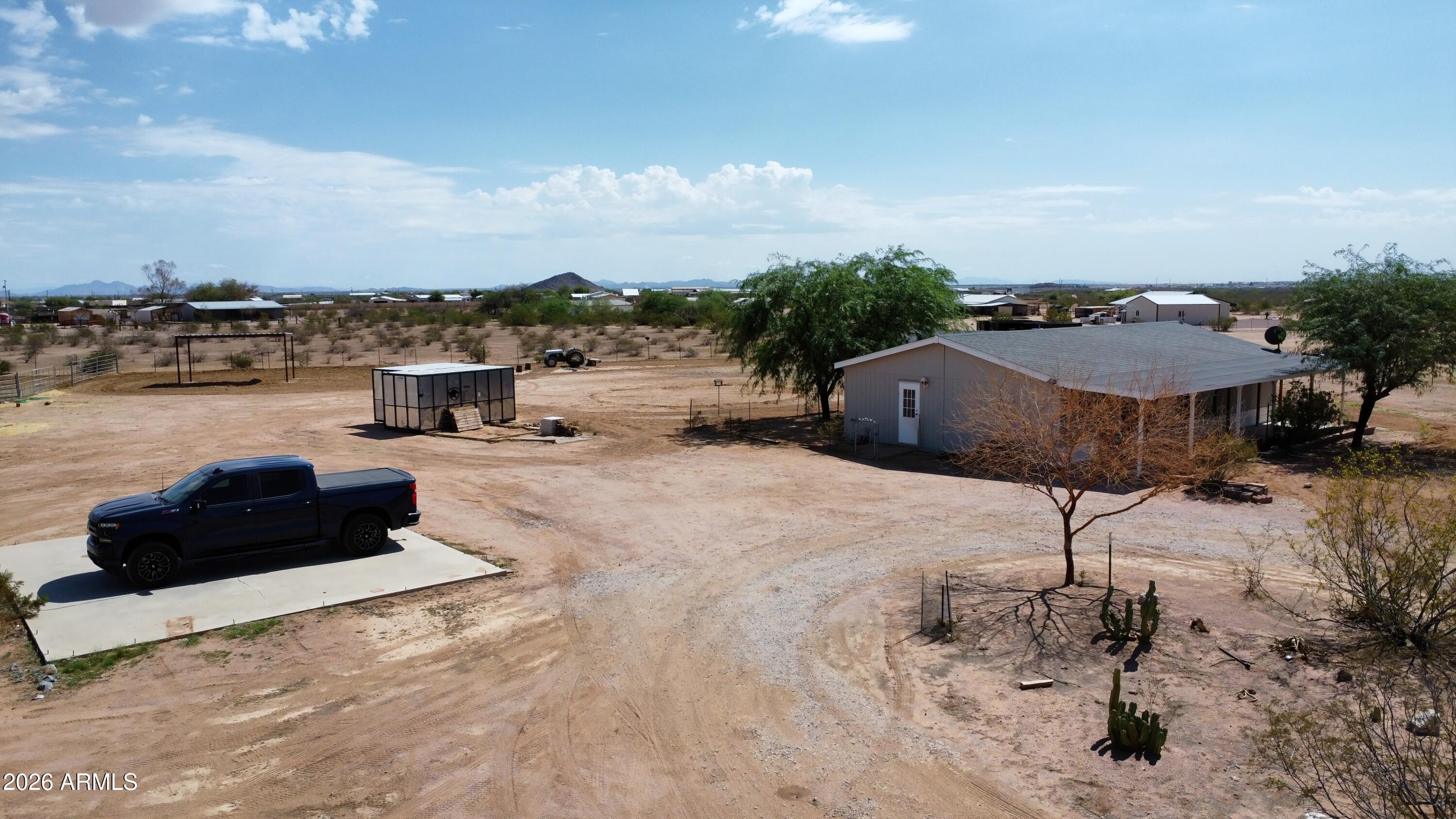 20163 North Sage Street Maricopa, AZ 85139 - Photo 45 of 54 a view of a terrace with chairs
