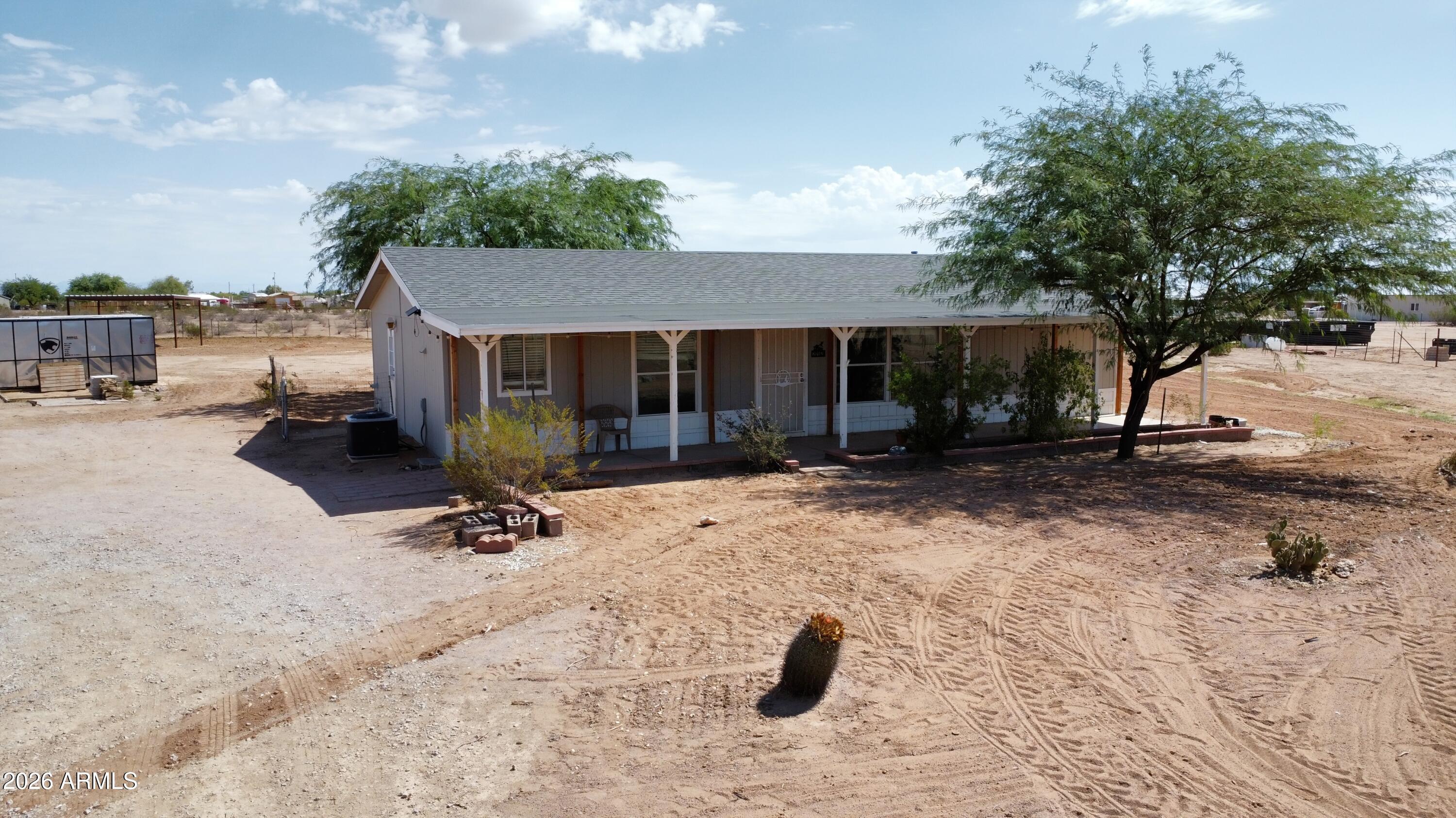 20163 North Sage Street Maricopa, AZ 85139 - Photo 46 of 54 a view of a chairs and table in the patio