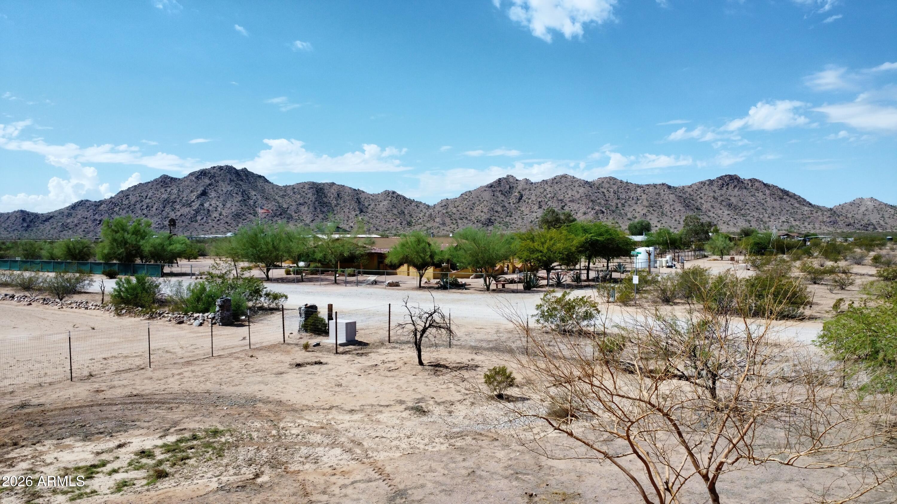 20163 North Sage Street Maricopa, AZ 85139 - Photo 48 of 54 a view of a lake with a mountain