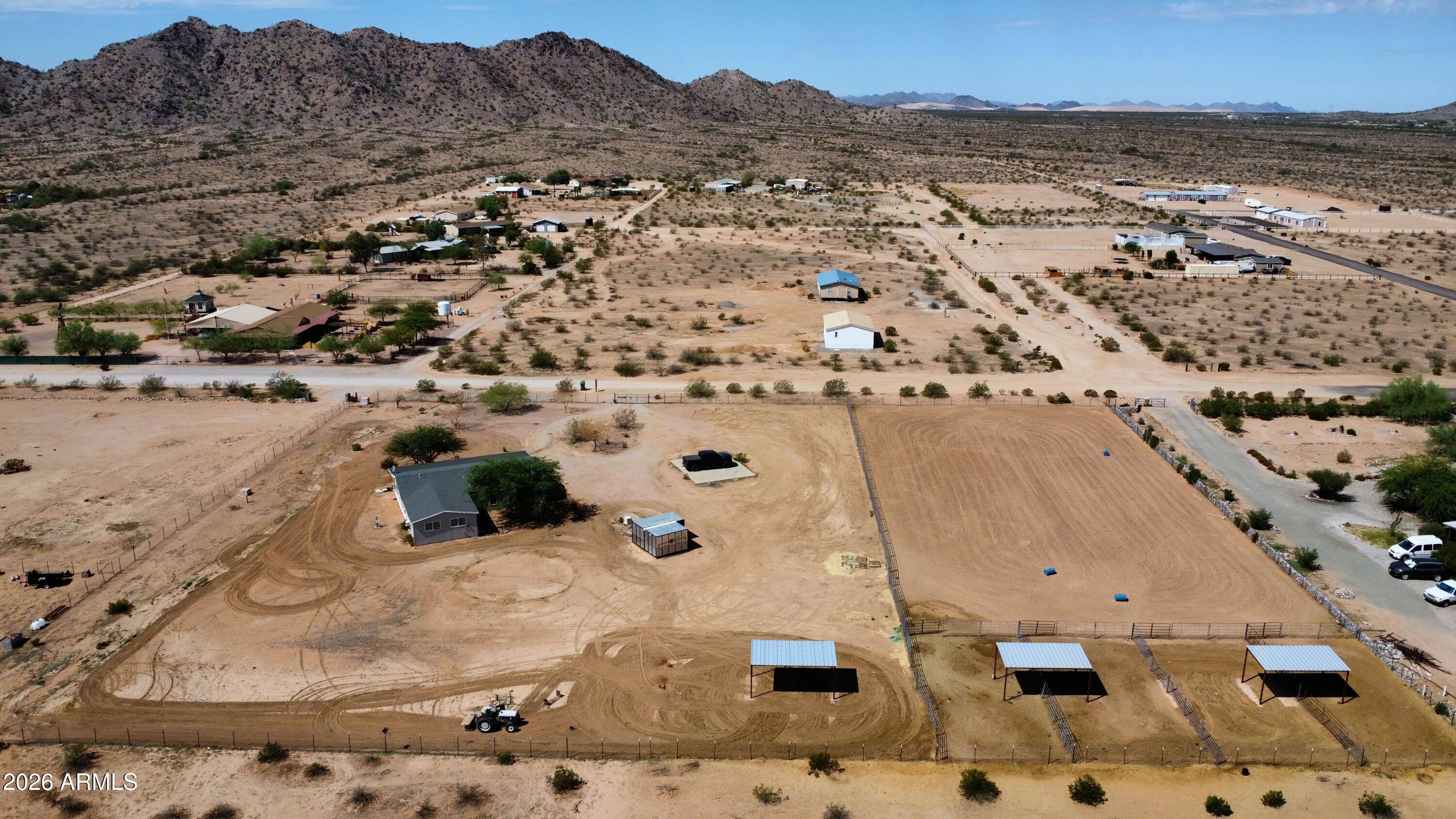 20163 North Sage Street Maricopa, AZ 85139 - Photo 51 of 54 an aerial view of residential houses with outdoor space