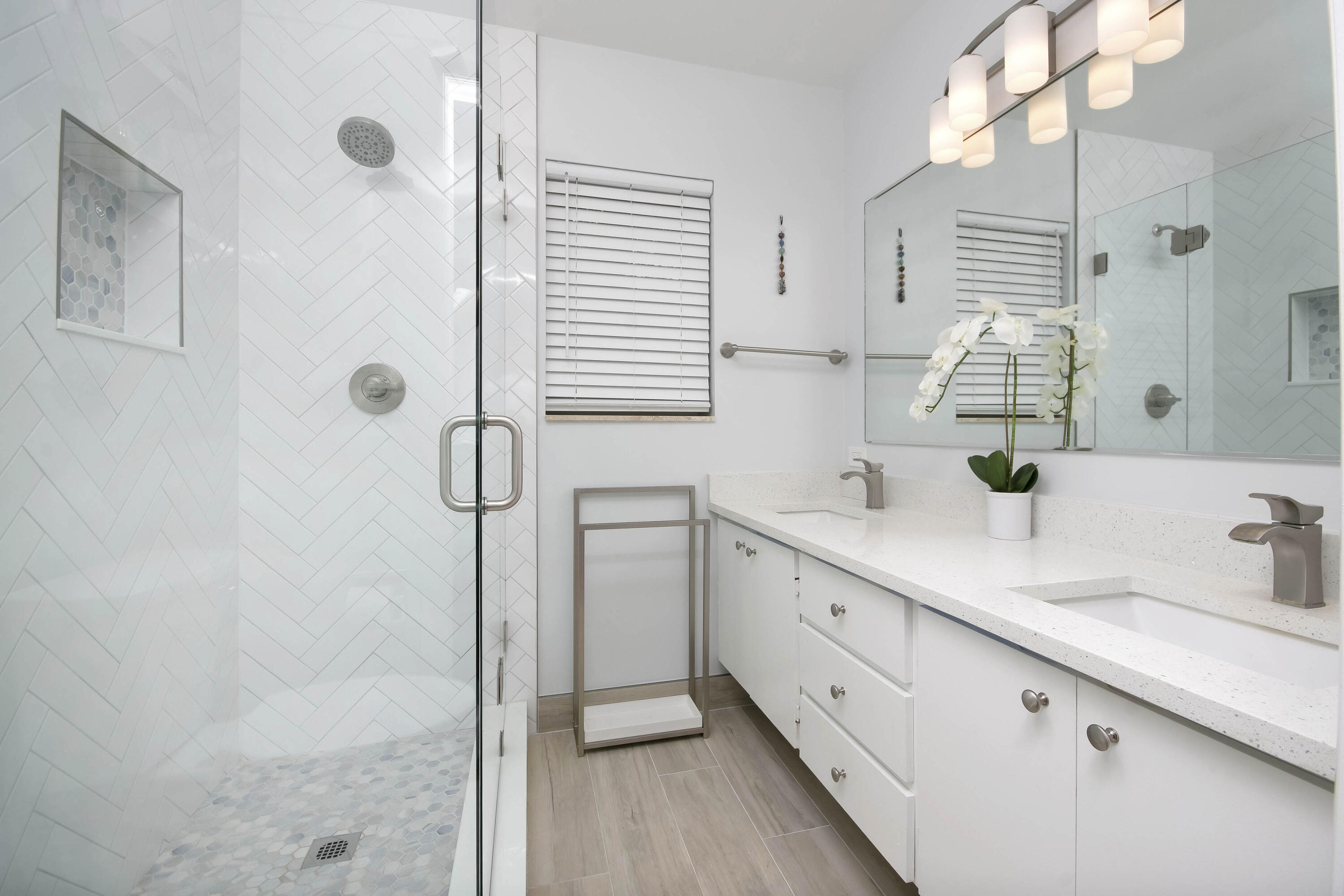 4603 Roxbury Court Boynton Beach, FL 33436 - Photo 11 of 19 a bathroom with a double vanity sink mirror and shower