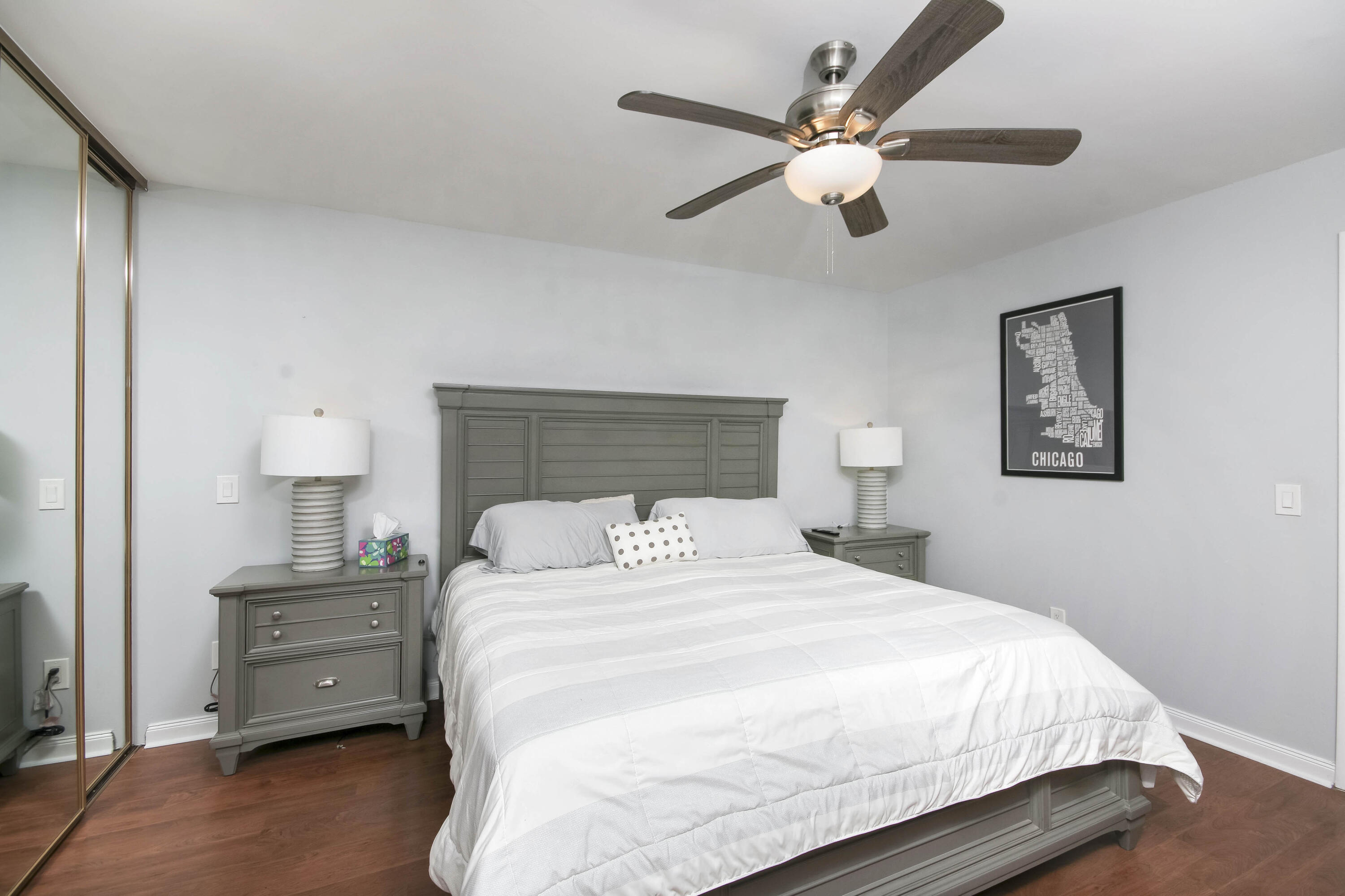 4603 Roxbury Court Boynton Beach, FL 33436 - Photo 10 of 19 a bedroom with a bed and a ceiling fan