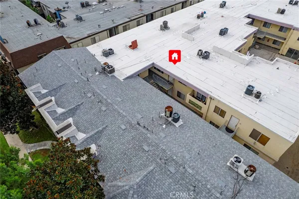 an aerial view of residential house with outdoor space