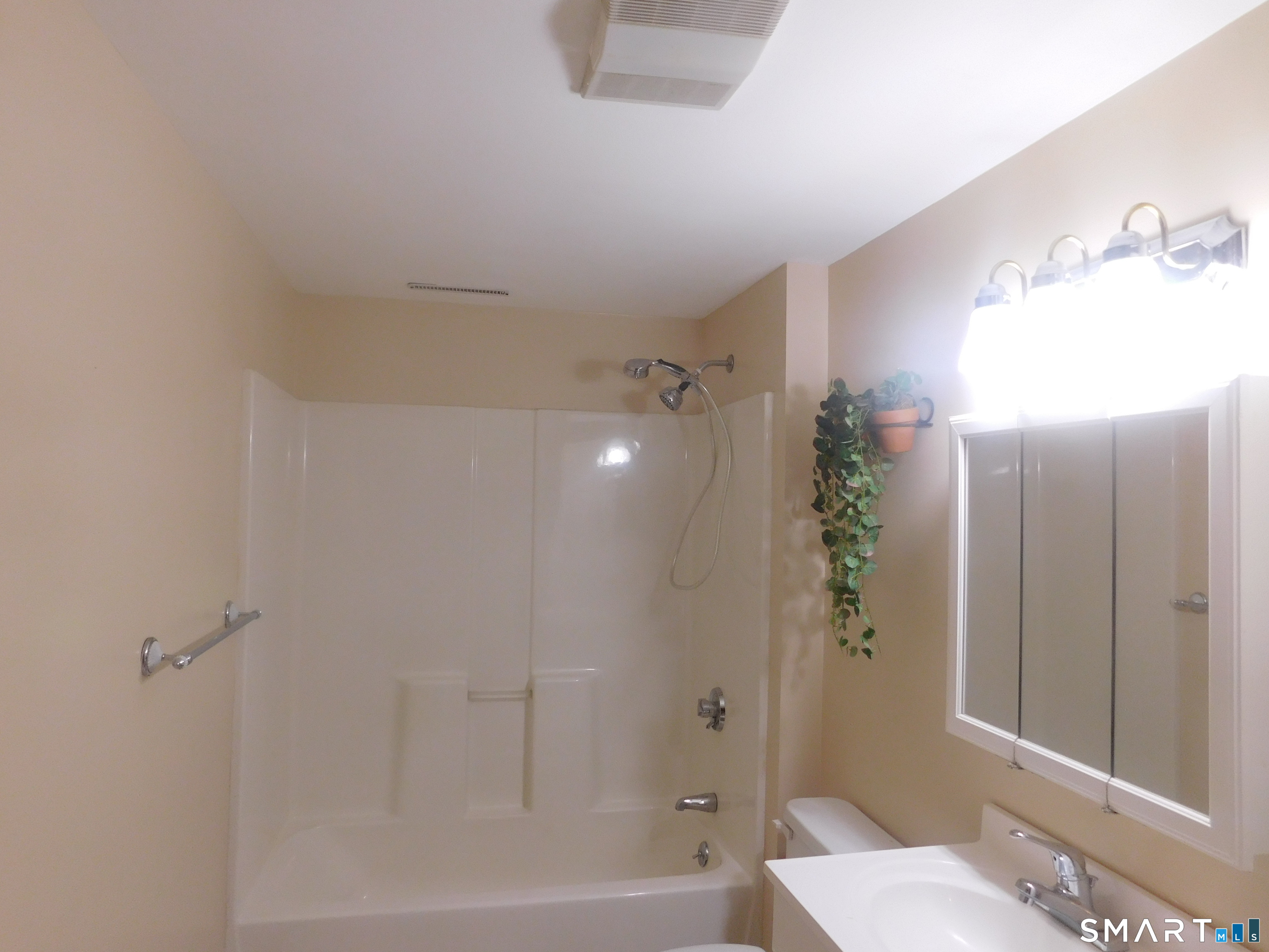 6 Daybreak Lane, Unit STUDIO Shelton, CT 06484 - Photo 5 of 7 a bathroom with a shower and a tub