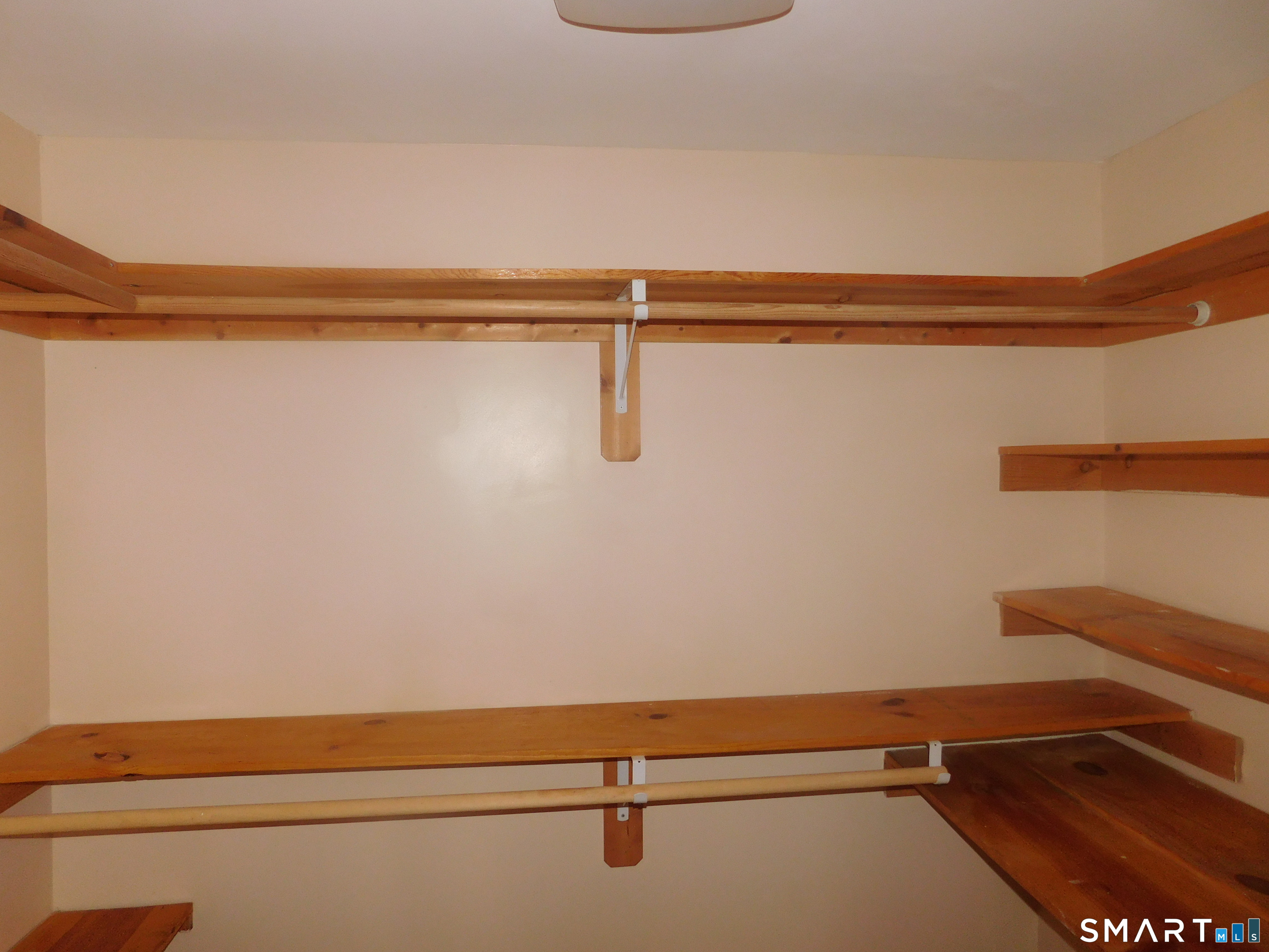 6 Daybreak Lane, Unit STUDIO Shelton, CT 06484 - Photo 6 of 7 a view of a room with racks on the wall