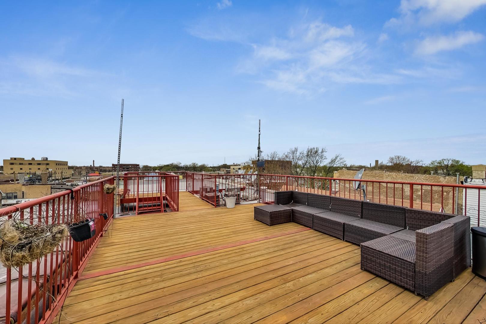 4017 North Troy Street, Unit 2W Chicago, IL 60618 - Photo 16 of 18 a view of roof deck with patio