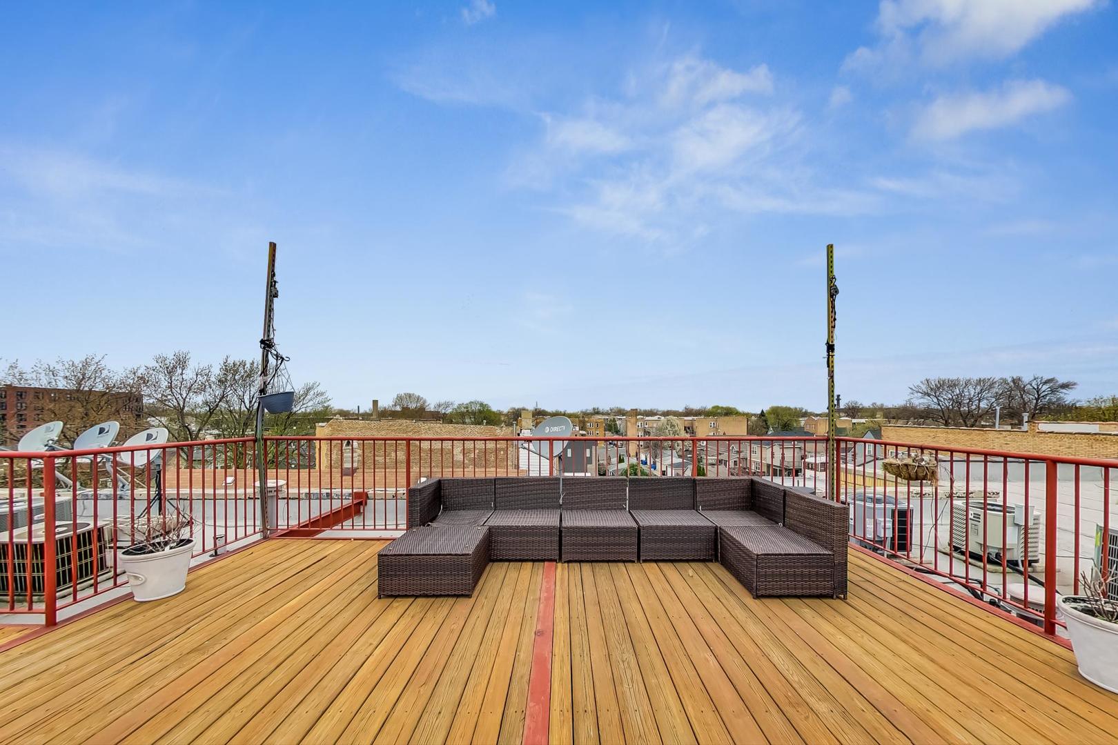 4017 North Troy Street, Unit 2W Chicago, IL 60618 - Photo 17 of 18 a view of roof deck with patio