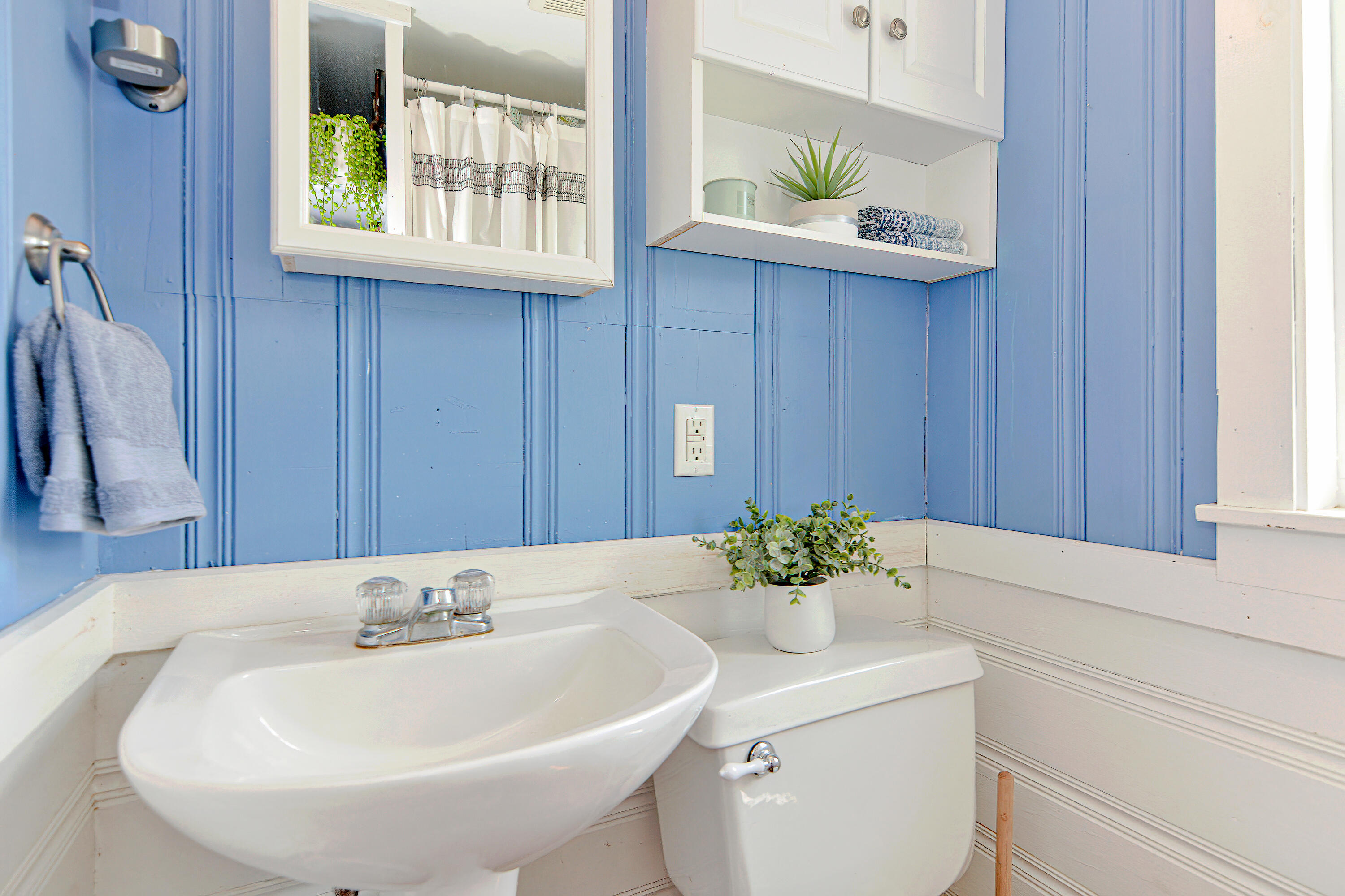 279 Harbor Point Road, Unit 12 Cummaquid, MA 02675 - Photo 11 of 35 a bathroom with a sink and a mirror