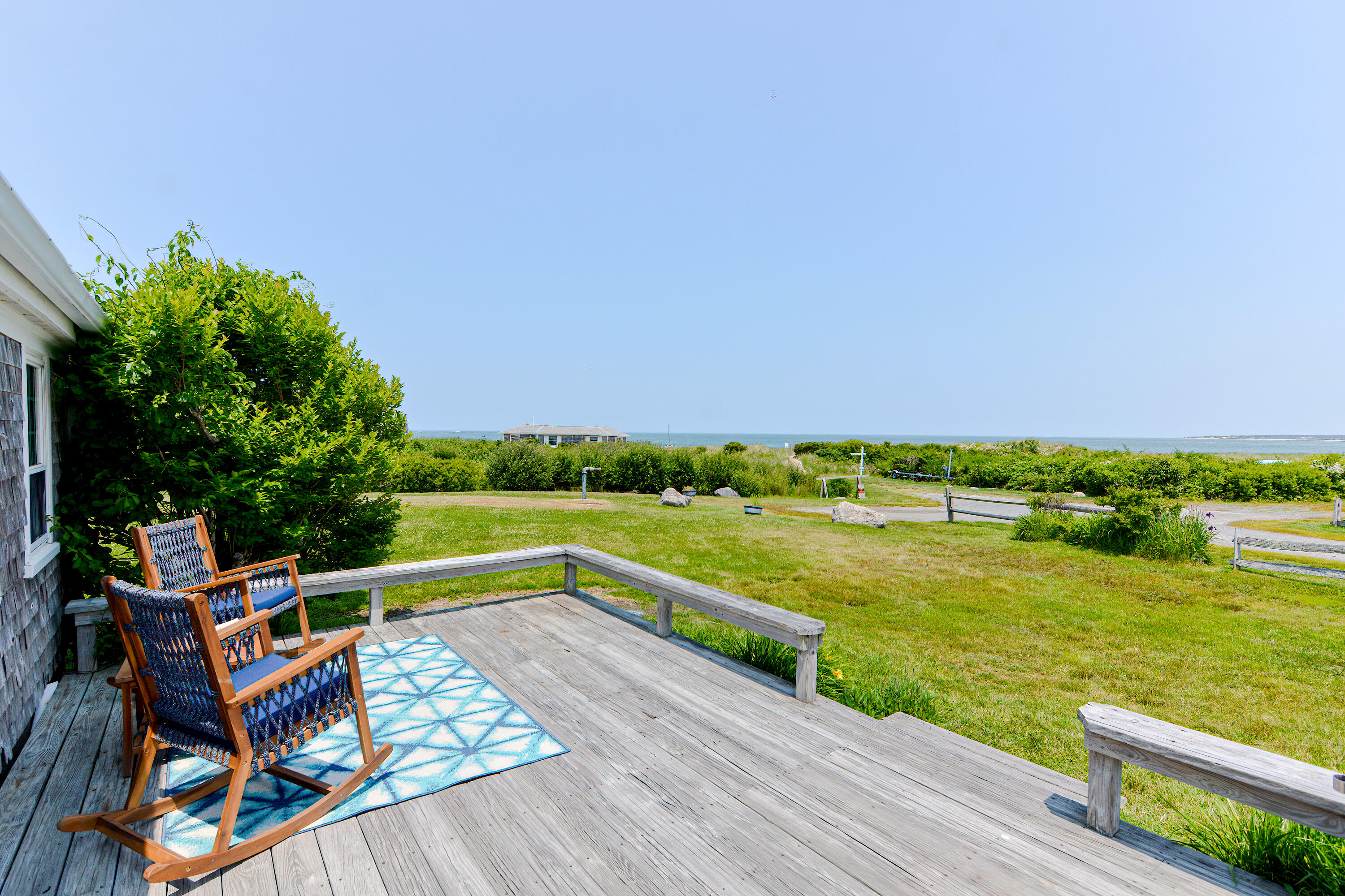 279 Harbor Point Road, Unit 12 Cummaquid, MA 02675 - Photo 18 of 35 a view of a ocean from a balcony
