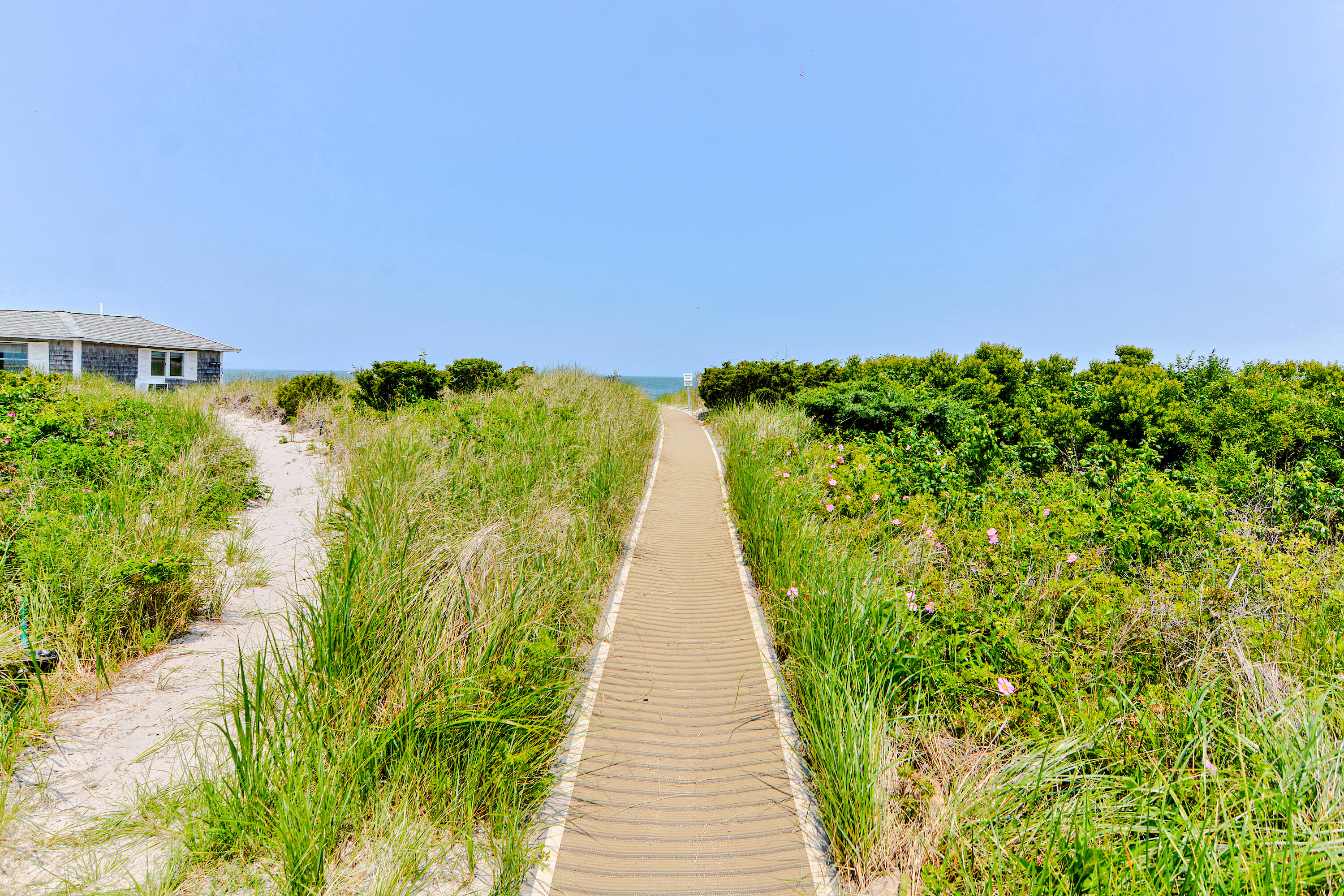 279 Harbor Point Road, Unit 12 Cummaquid, MA 02675 - Photo 30 of 35 a view of a pathway with a garden