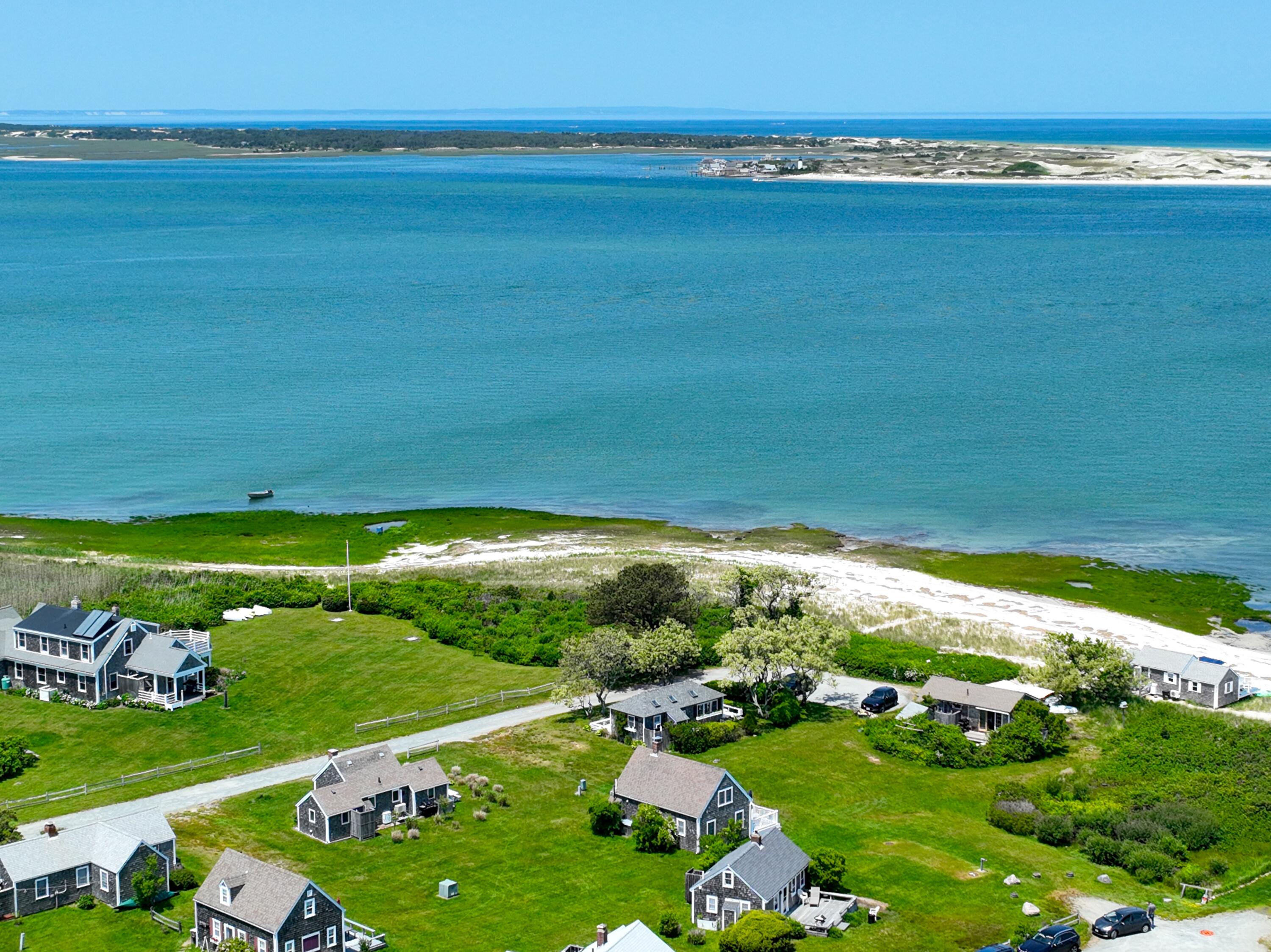 279 Harbor Point Road, Unit 12 Cummaquid, MA 02675 - Photo 31 of 35 a view of a field with an ocean