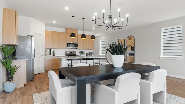 a bedroom with a bed and a potted plant