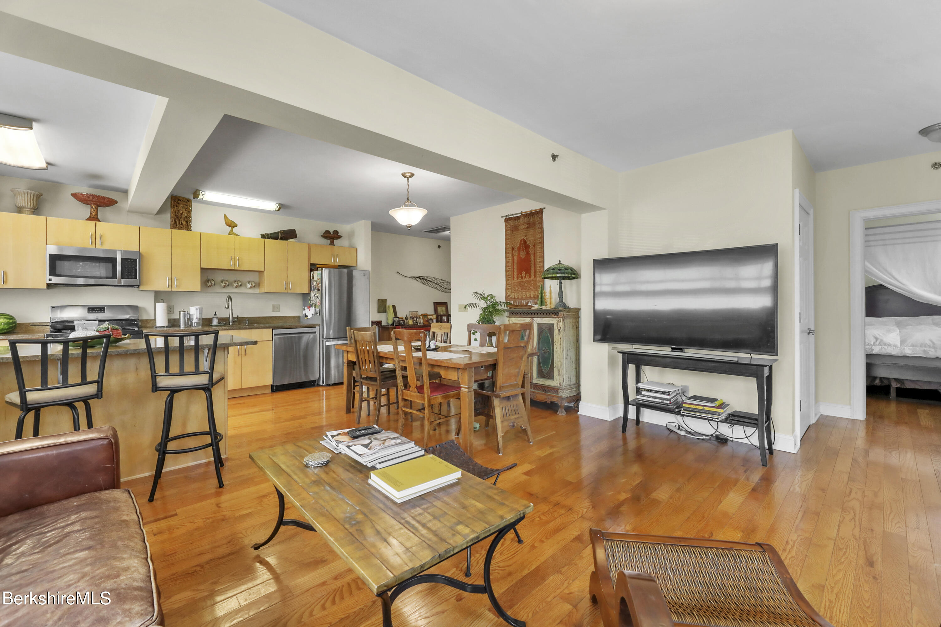 29 Main Street West Stockbridge, MA 01266 - Photo 16 of 51 a living room with lots of furniture and kitchen view