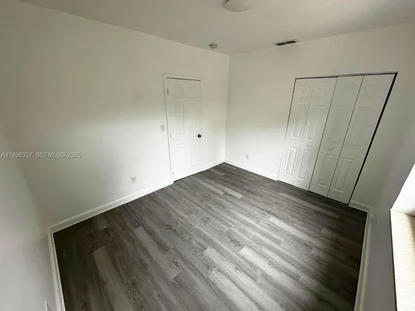 a bathroom with a toilet sink and bathtub