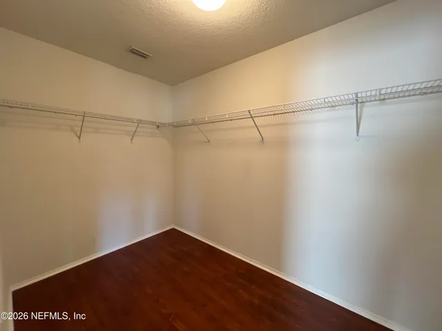 a bathroom with a shower and a tub
