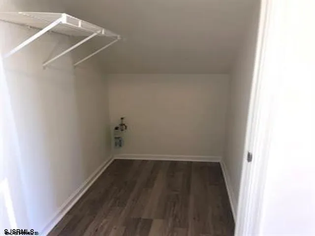 a view of small space with racks on the wall