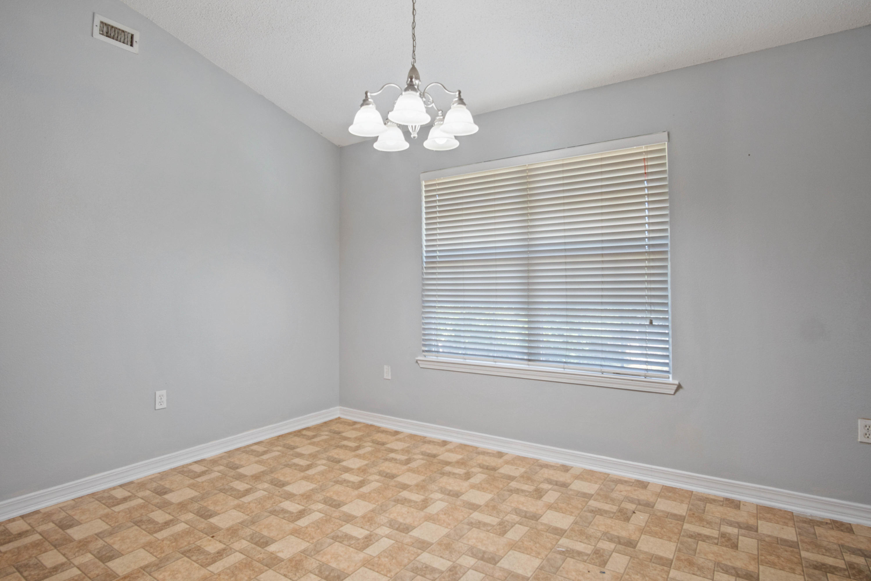 427 Triton Street Crestview, FL 32536 - Photo 11 of 32 a view of an empty room with a window