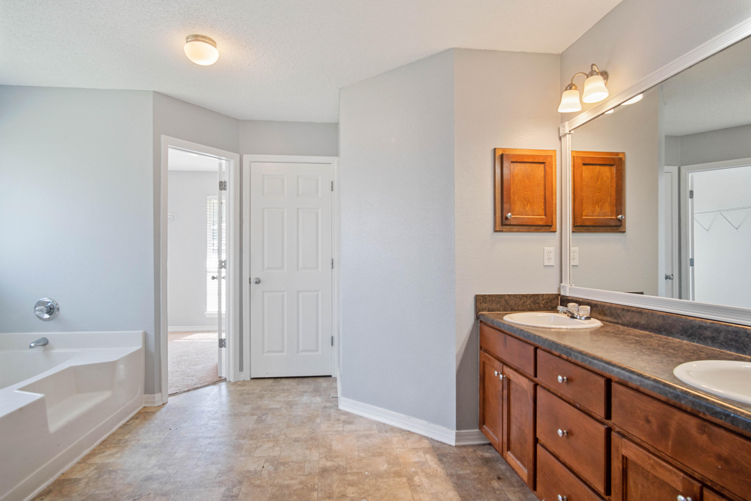 427 Triton Street Crestview, FL 32536 - Photo 28 of 32 a bathroom with a sink and a bathtub