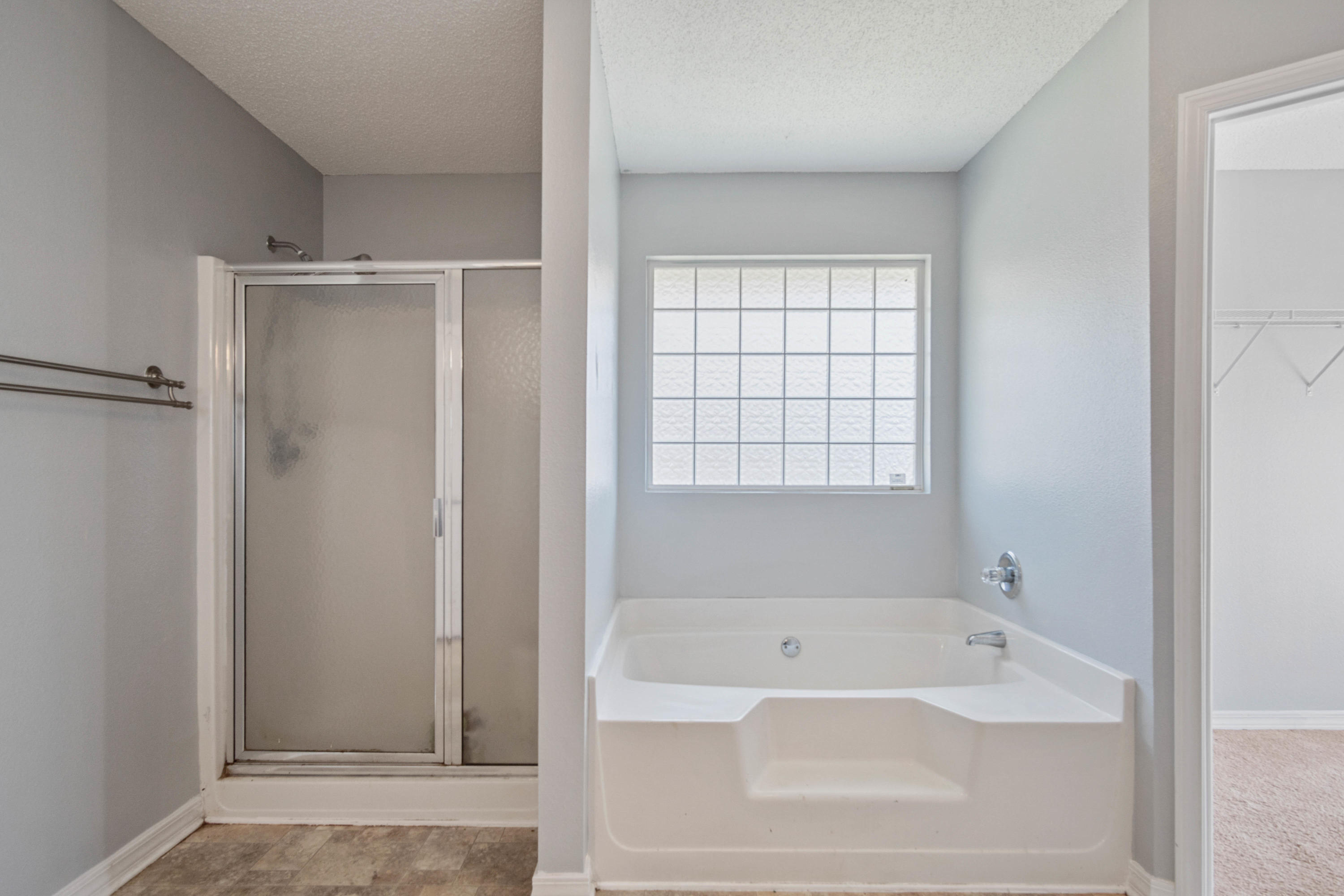 427 Triton Street Crestview, FL 32536 - Photo 29 of 32 a bathroom with a bathtub and a shower
