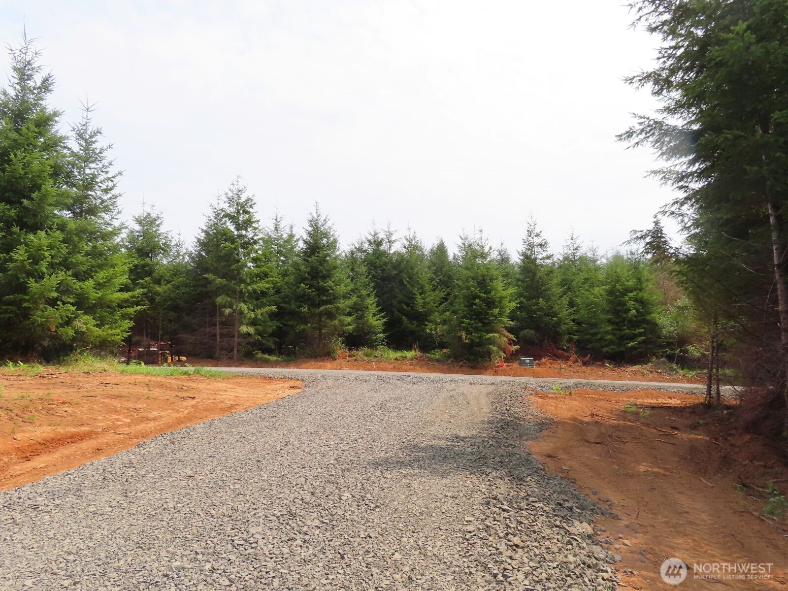 -lot D Mill Creek Road Longview, WA 98632 - Photo 20 of 25 a view of a dirt field with trees in the background