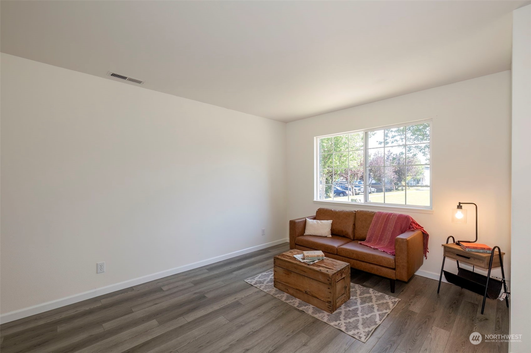 3982 Broadmoor Loop Bremerton, WA 98310 - Photo 11 of 40 a living room with furniture and a window