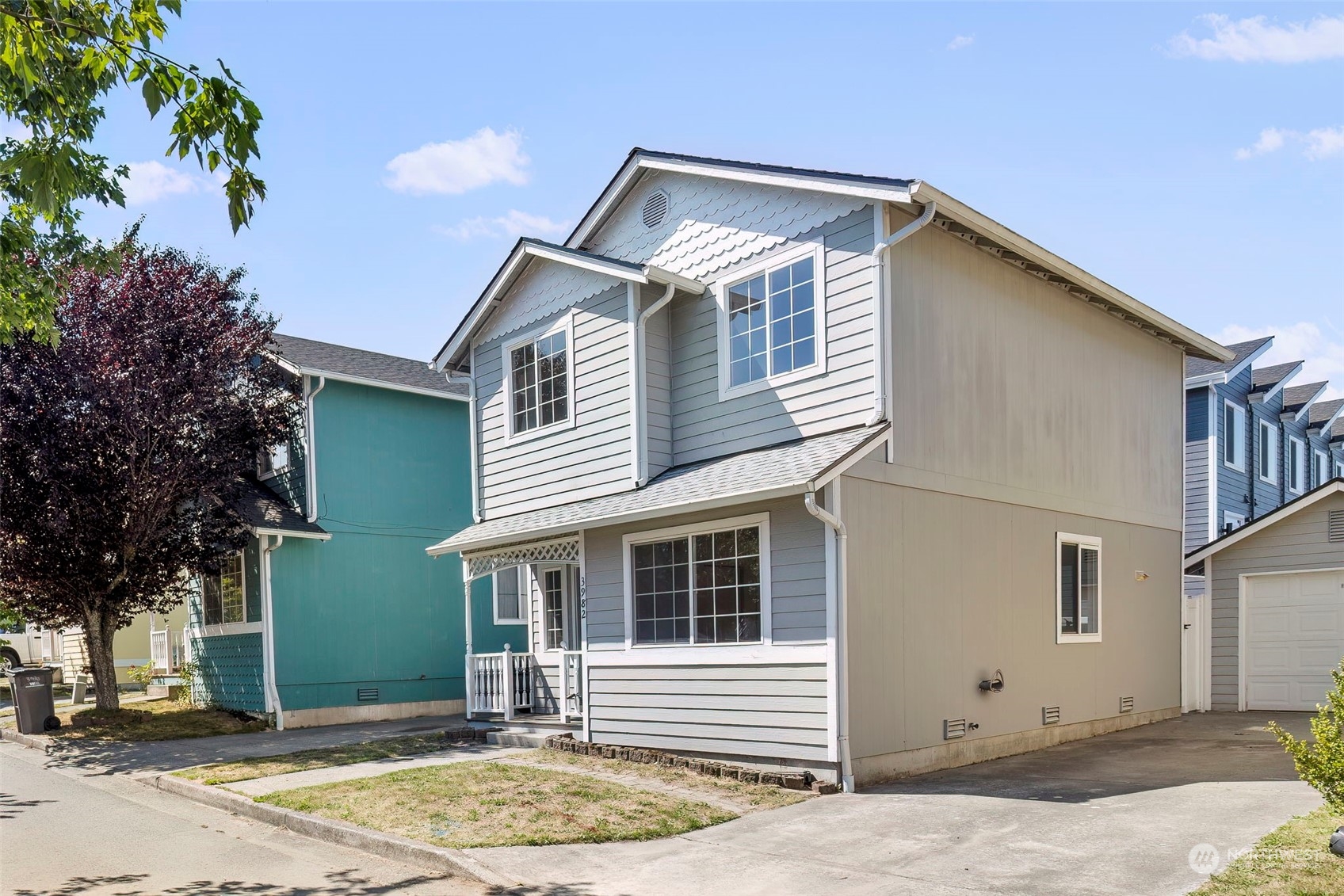 3982 Broadmoor Loop Bremerton, WA 98310 - Photo 2 of 40 a front view of a house with a backyard