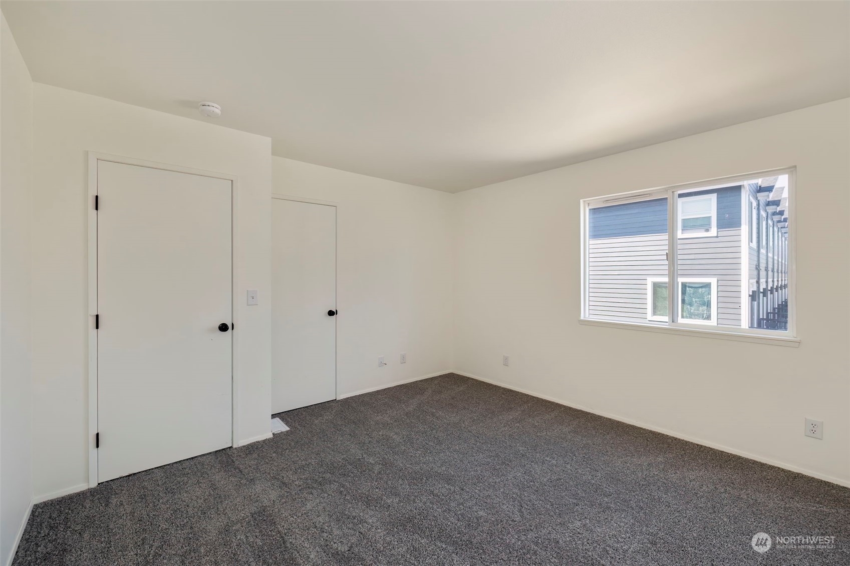 3982 Broadmoor Loop Bremerton, WA 98310 - Photo 24 of 40 a view of an empty room with a window