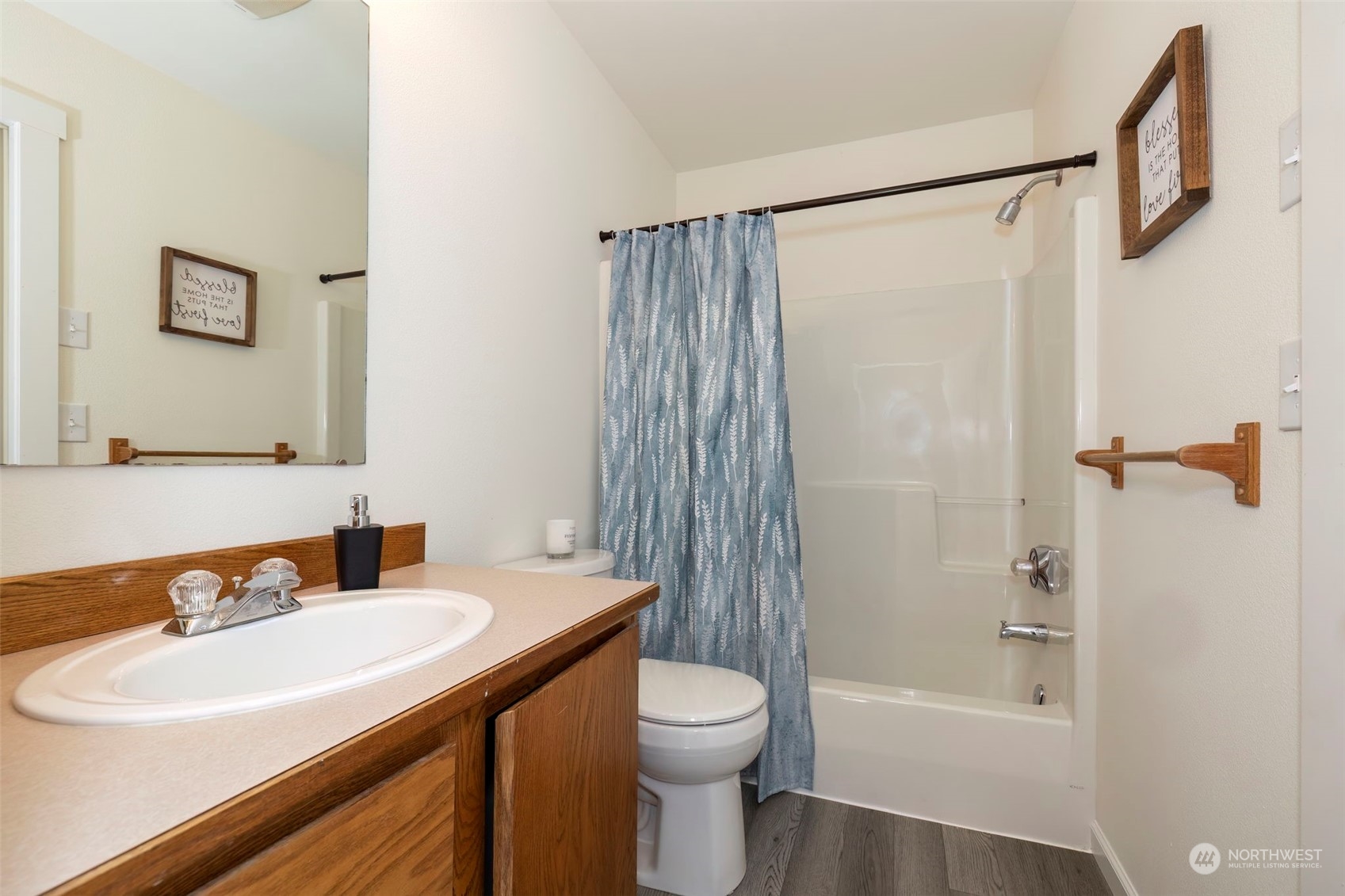 3982 Broadmoor Loop Bremerton, WA 98310 - Photo 26 of 40 a bathroom with a sink toilet and shower