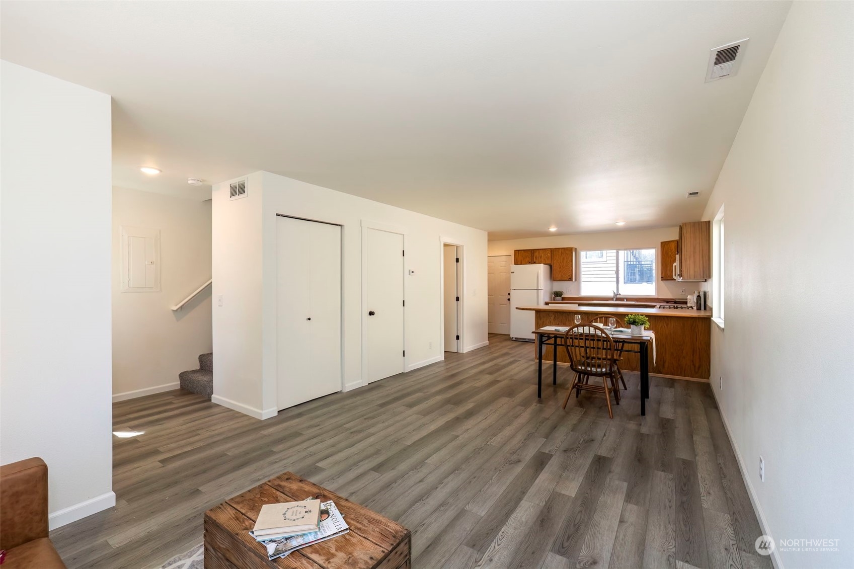 3982 Broadmoor Loop Bremerton, WA 98310 - Photo 9 of 40 a view of a room with wooden floor furniture and windows