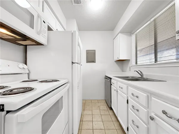 $115,000 | 7122 Premont Drive, Unit C202, Corpus Christi, TX 78414