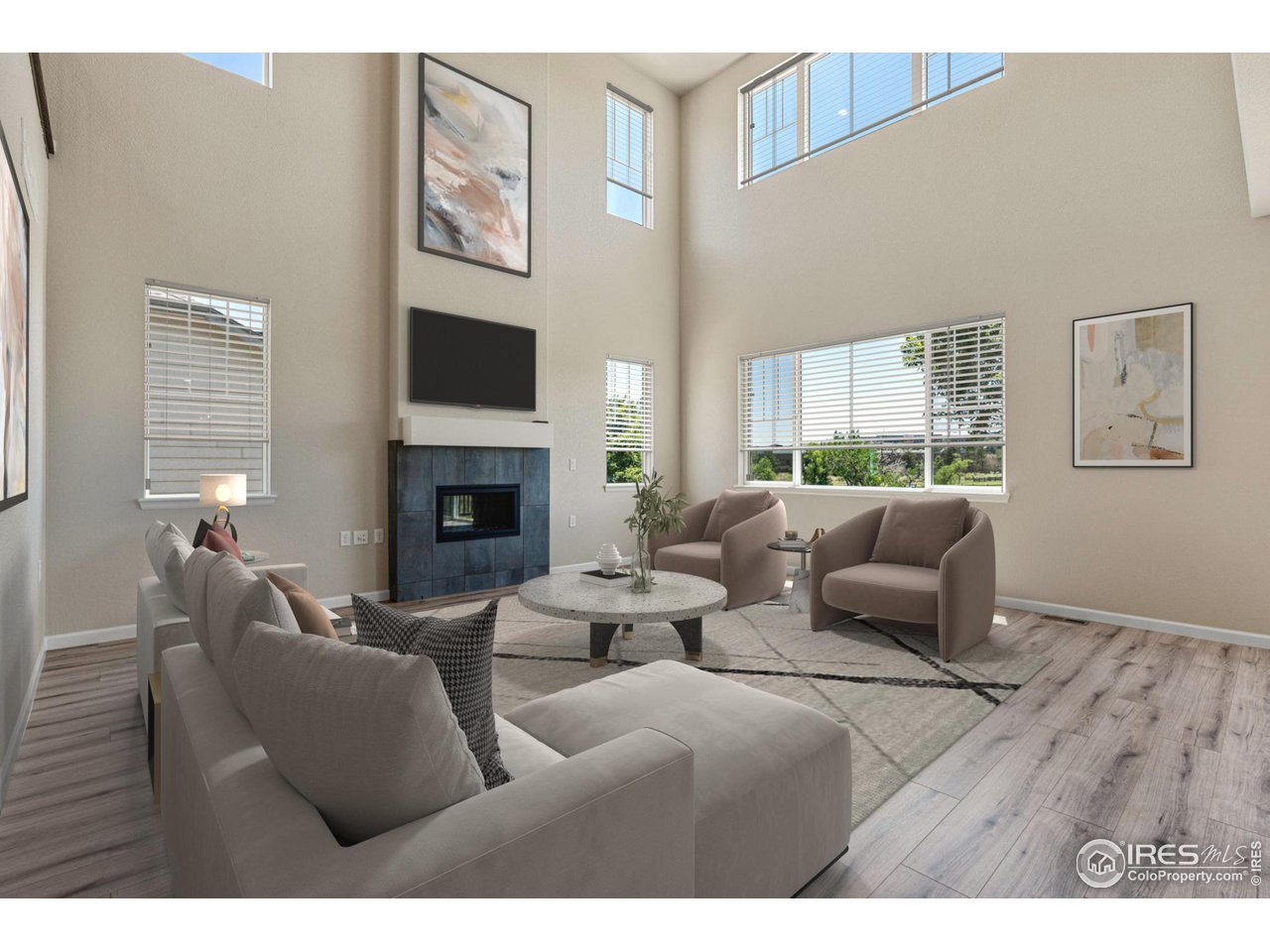 1382 Eldorado Drive Superior, CO 80027 - Photo 2 of 40 a living room with furniture a flat screen tv and a fireplace