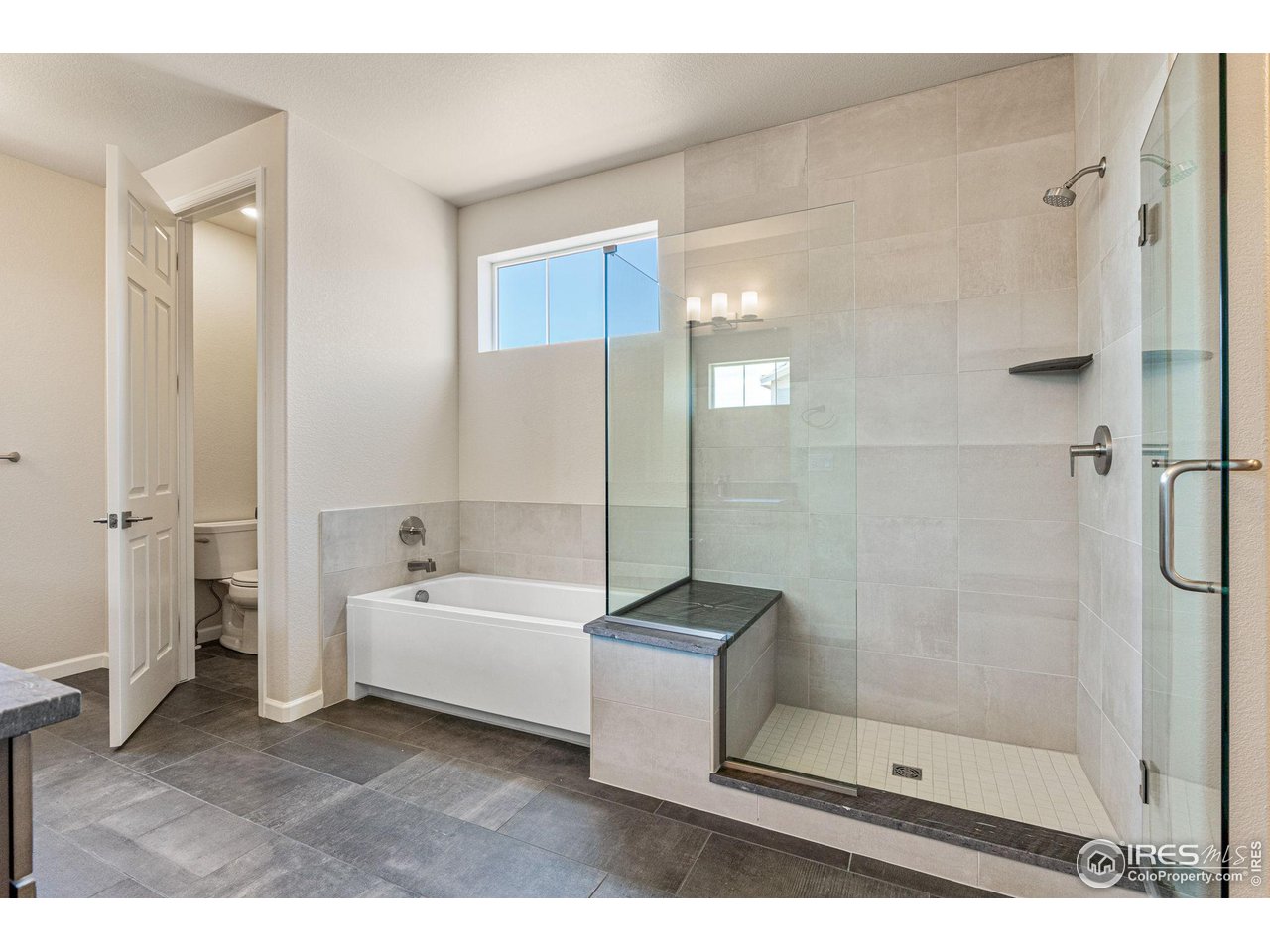 1382 Eldorado Drive Superior, CO 80027 - Photo 22 of 40 a bathroom with a bathtub and a shower