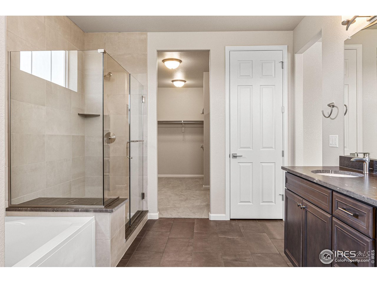 1382 Eldorado Drive Superior, CO 80027 - Photo 24 of 40 a bathroom with a shower and a sink