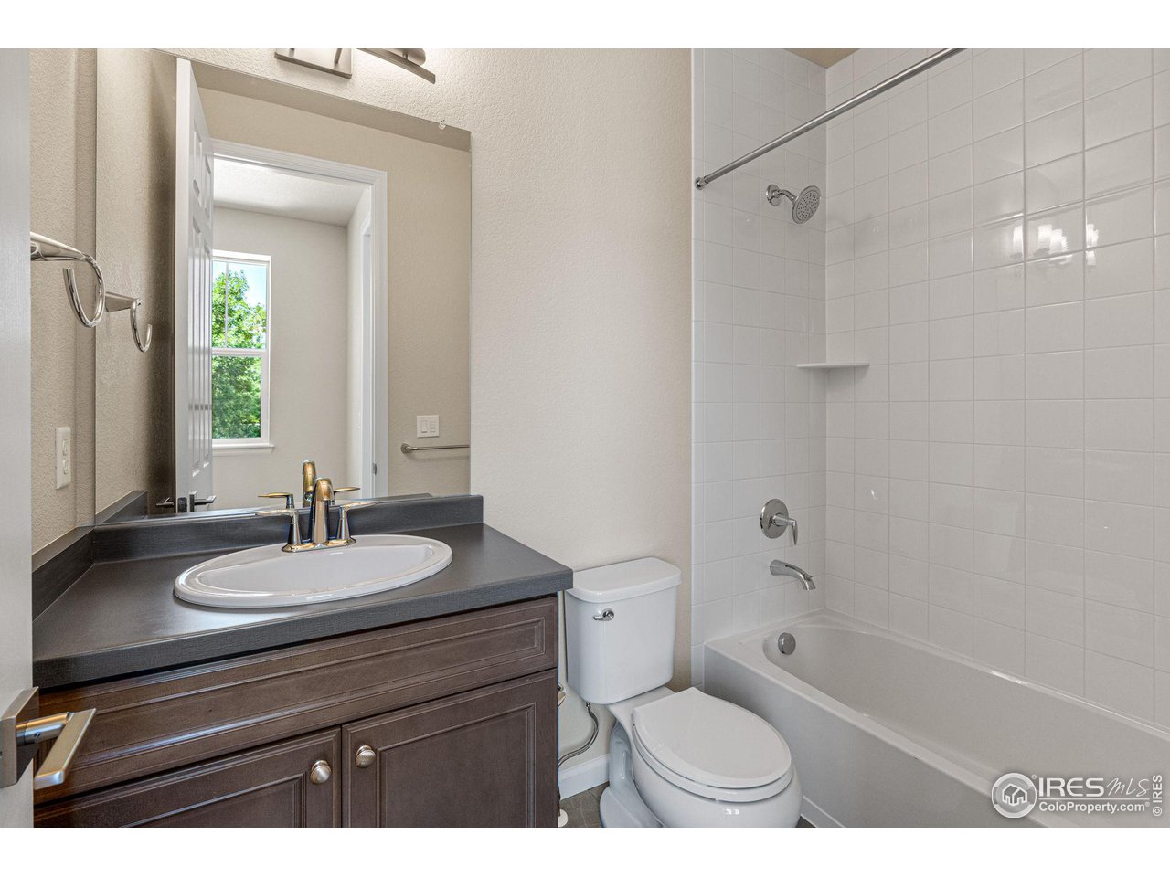 1382 Eldorado Drive Superior, CO 80027 - Photo 28 of 40 a bathroom with a sink a toilet and shower