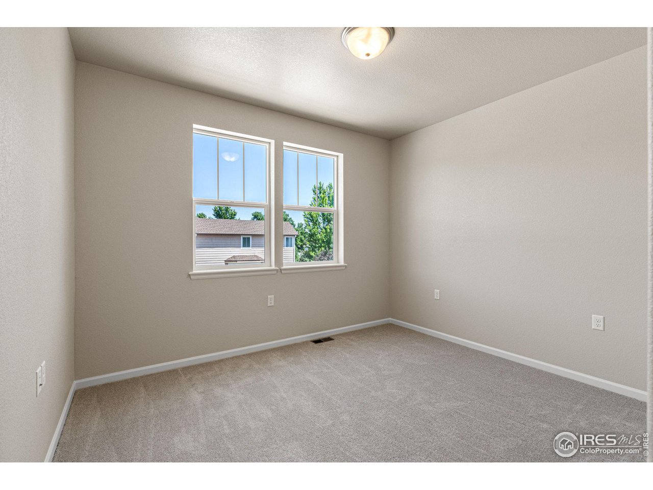 1382 Eldorado Drive Superior, CO 80027 - Photo 30 of 40 an empty room with windows