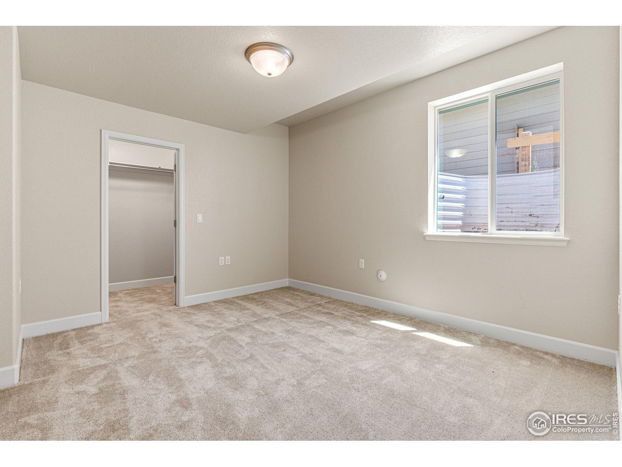 1382 Eldorado Drive Superior, CO 80027 - Photo 35 of 40 a view of an empty room with a window