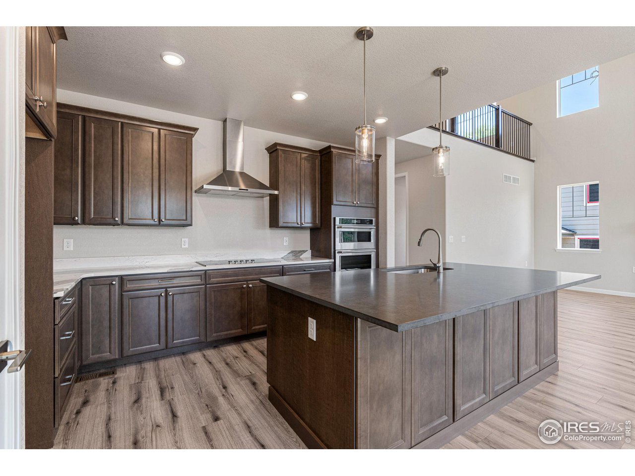 1382 Eldorado Drive Superior, CO 80027 - Photo 8 of 40 a kitchen with stainless steel appliances granite countertop a sink a stove and a refrigerator