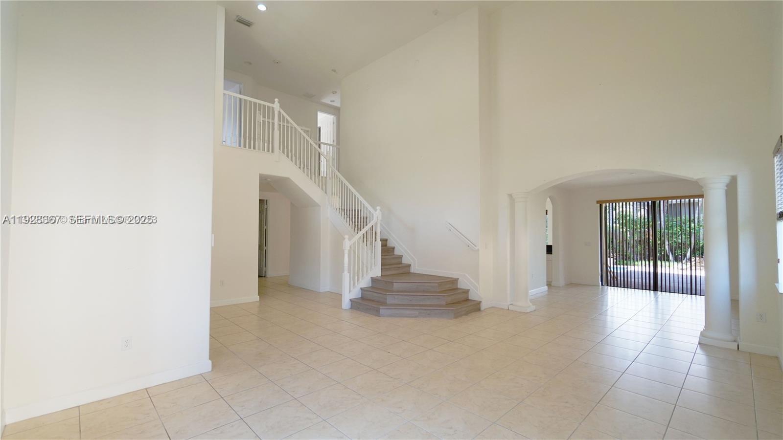 7507 Southwest 189th Street, Unit 7507 Cutler Bay, FL 33157 - Photo 7 of 28 a view of entryway and hall