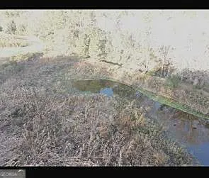 a view of roof with wooden floor