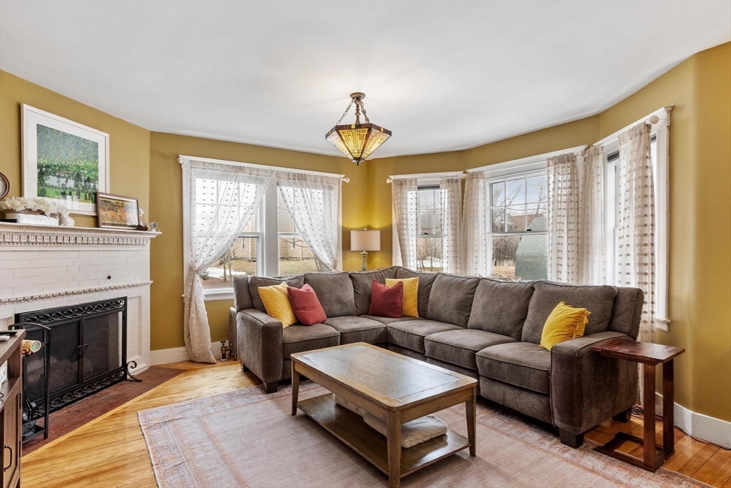 20 Shattuck Street Littleton, MA 01460 - Photo 13 of 41 a living room with furniture and a fireplace