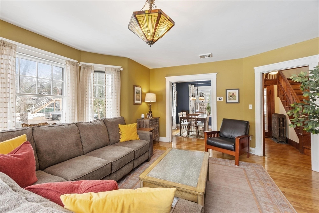 20 Shattuck Street Littleton, MA 01460 - Photo 14 of 41 a living room with furniture and a large window