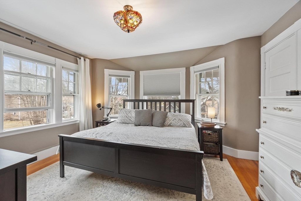 20 Shattuck Street Littleton, MA 01460 - Photo 26 of 41 a bedroom with a bed and a table